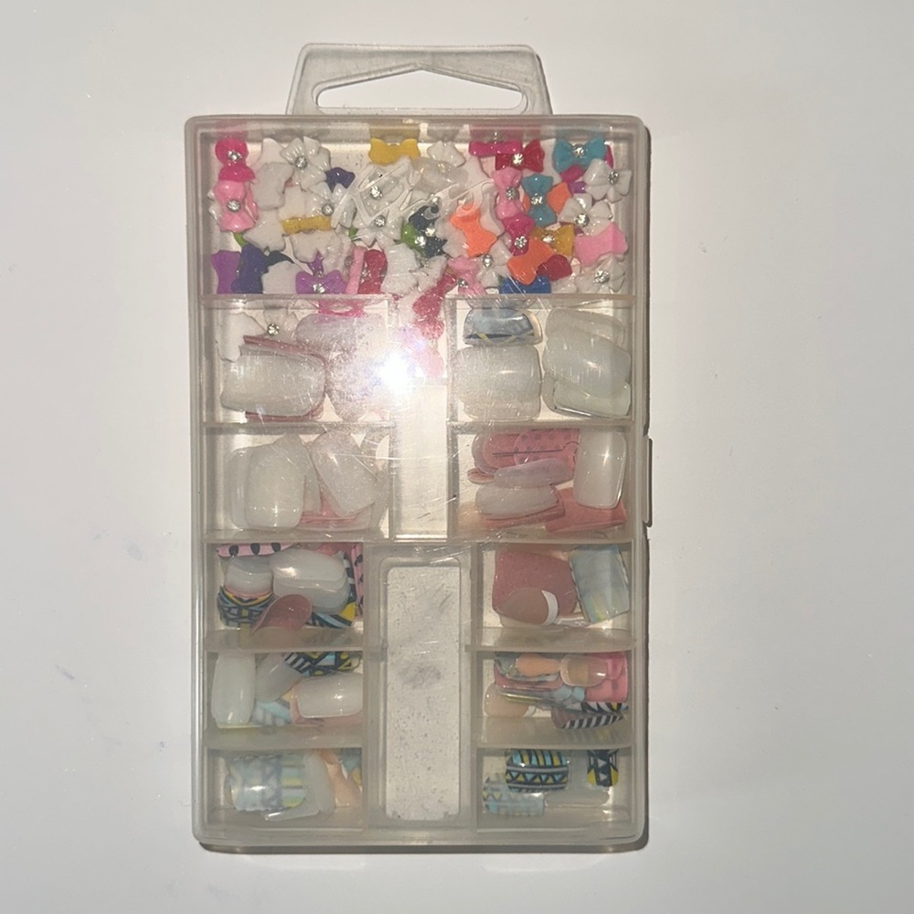 assortment of press in nail and bows